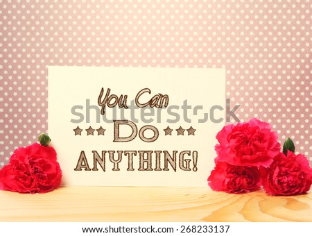 You Can Do Anything Message Card with Carnation Flowers on Top of a Wooden Table