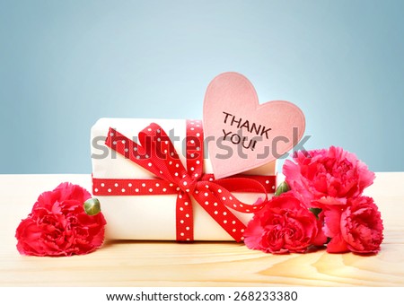 Thank You message with gift box and pink carnations
