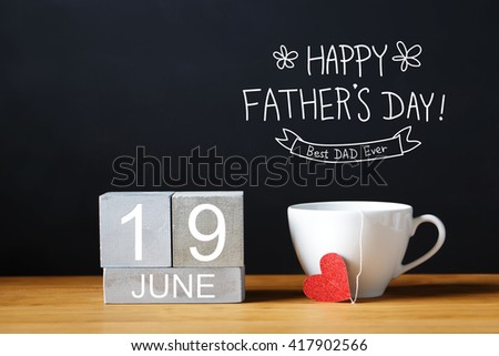 Fathers Day message with coffee cup with wooden blocks