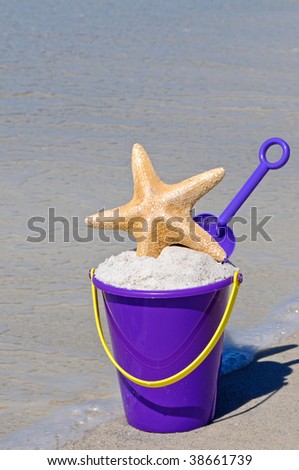 Beach Bucket full of sand with a Starfish