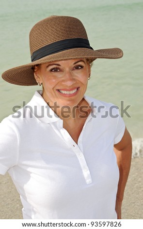 Attractive Middle Aged Woman Wearing Summer Hat