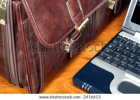 Leather Briefcase and Laptop Computer