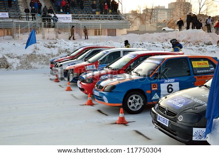 RUSSIA SAMARA - FEBRUARY 12: A group of cars are at the start, Cup of Russia in winter track motor racing February 12, 2012 in Samara, Russia