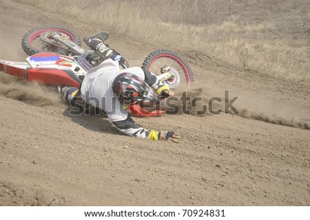 SAMARA, RUSSIA - APRIL 17: An unidentified rider crashes during the Samara Motocross Regional Championship on April 17, 2010 in Samara, Russia.