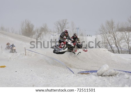 SAMARA, RUSSIA  - JANUARY 30: unidentified rider at the snow cross Russia Championship in Samara, Russia on January 30, 2011