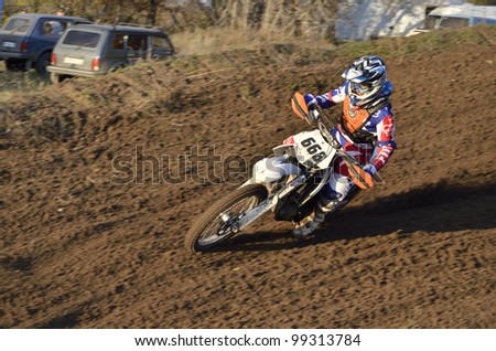 RUSSIA, SAMARA - OCTOBER 17: Motorcycle racer A. Nikishkin on a motorbike accelerating on a sandy track the Open Cup 
