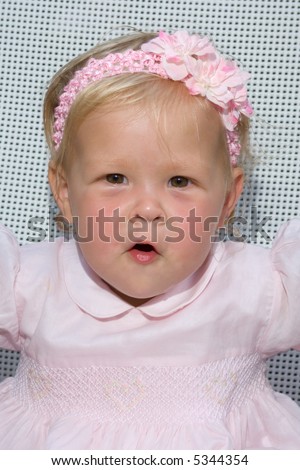 Baby Girl with Bow in Hair