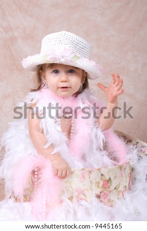 Adorable Little girl Playing Dress Up