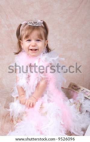 Adorable Little Girl Playing Dress Up