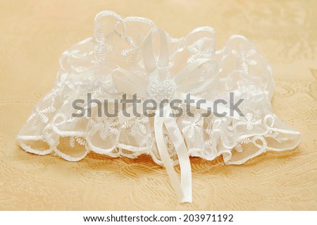 White wedding garter for the beautiful bride