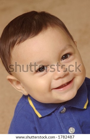 Adorable toddler flashing a cute 2-toothed smile