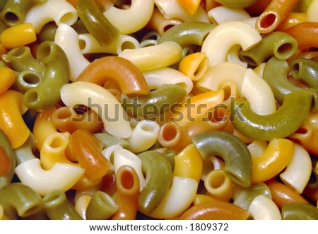 Closeup of cooked macaroni elbows of various colors