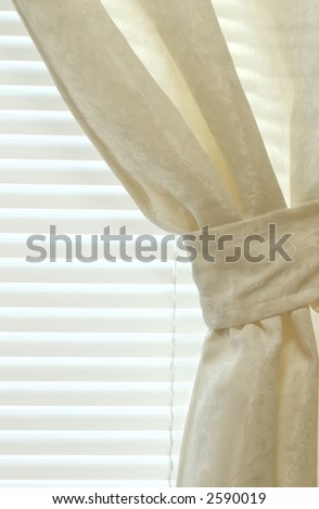 Detail of an interior curtain and blinds