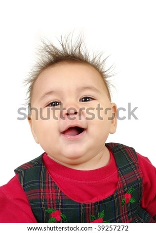 nine-month-old girl with funny spiky hair, isolated on white background