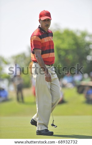 HUA HIN, THAILAND - JANUARY 9: Indian golfer Jeev Milkha Singh competes in the Royal Trophy Tournament, Asia vs Europe, at Black Mountain Golf Club on January 9, 2011 in Hua Hin, Thailand