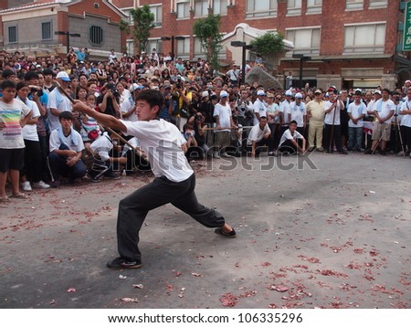 TAIPEI,TAIWAN- JUNE 24:The Traditional kung fu show in  Culture and Art Festival of Tamsui Shing Shuei Yan on June 24,2012 in Taipei,Taiwan. The fair held annually for honor of the Ching-Shui Master.