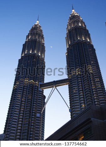 KUALA LUMPUR, MALAYSIA - APRIL 15:Petronas Twin Towers at twilight on APRIL 15, 2013 in Kuala Lumpur.Petronas Twin Towers are twin skyscrapers and were tallest buildings in the world from 1998 to 2004