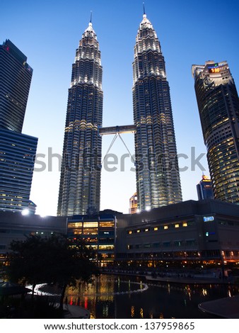 KUALA LUMPUR, MALAYSIA - APRIL 15: Petronas Twin Towers at night on April 15, 2013 in Kuala Lumpur. Petronas Twin Towers were the tallest buildings (452 m) in the world from 1998 to 2004.