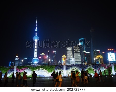 SHANGHAI, CHINA - MAY 23: The Pudong skyline by night viewed from the Bund on May 23, 2014 in Shanghai, China.