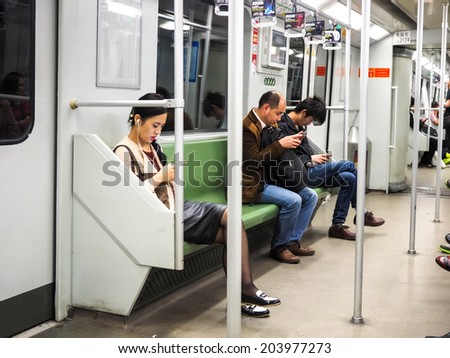 SHANGHAI, CHINA - MAY 17: Shanghai subway station interior on May 17, 2014 in Shanghai, China. The Shanghai Metro system has 12 lines, 287 stations and is the longest and 3th busiest in the world.