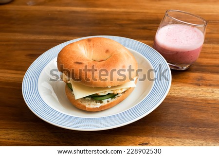 Bagel Omelet and bacon sandwich top view