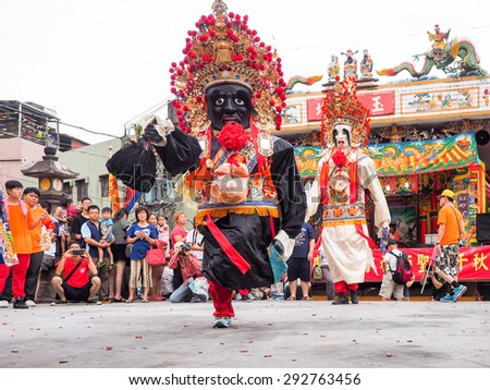 TAIPEI,TAIWAN - June 21 : The folk-custom acrobatics in the temple fair of township on June 21,2015 in Tamsui,Taipei,Taiwan. The fair held annually on chinese lunar date of sixth in May