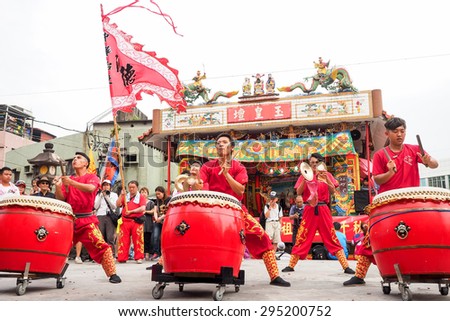 TAMSUI,TAIWAN- June 21:The Dragon Drums Dance Show in Culture Festival of Tamsui Shing Shuei Yan on June 21,2015 in Tamsui,Taipei,Taiwan. The fair held annually for honor of the Ching-Shui Master.