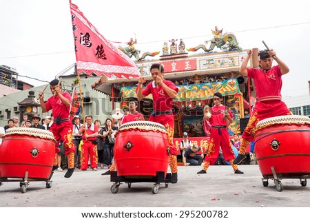 TAMSUI,TAIWAN- June 21:The Dragon Drums Dance Show in Culture Festival of Tamsui Shing Shuei Yan on June 21,2015 in Tamsui,Taipei,Taiwan. The fair held annually for honor of the Ching-Shui Master.