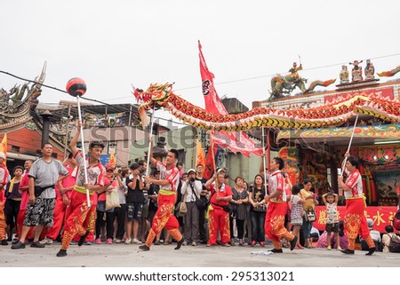 TAMSUI,TAIWAN- June 21:The Dragon Dance Show in Culture Festival of Tamsui Shing Shuei Yan on June 21,2015 in Tamsui,Taipei,Taiwan. The fair held annually for honor of the Ching-Shui Master.