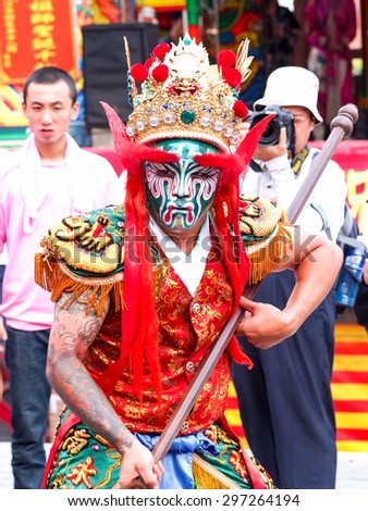 TAMSUI,TAIWAN- June 21:People dressed up statues of holy general in Culture Festival  on June 21,2015 in Tamsui,Taipei,Taiwan. The fair held annually for honor of the Ching-Shui Master.