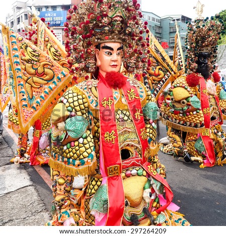 TAMSUI,TAIWAN- June 21:People dressed up statues of holy general in Culture Festival  on June 21,2015 in Tamsui,Taipei,Taiwan. The fair held annually for honor of the Ching-Shui Master.