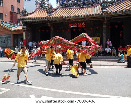 TAMSUI, TAIWAN - JUNE 20: The folk-custom acrobatics of the CingShuai temple fair on June 20, 2007 in Tamsui,Taipei,Taiwan. The fair held annually in honor of the Ching-Shui Master.