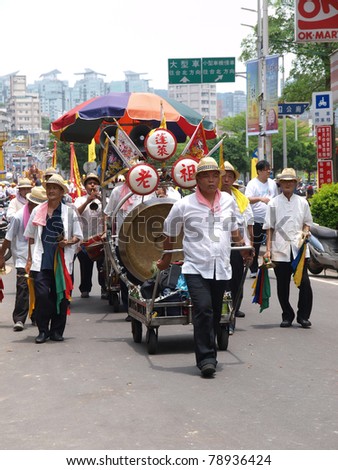 DANSHUI,TAIWAN- JUNE 7:The parade formation in Culture and Art Festival of Danshui Shing Shuei Yan  on June 7,2011 in Danshui,Taipei,Taiwan. The fair held annually for honor of the Ching-Shui Master.