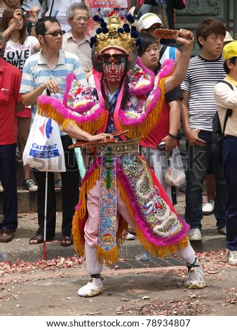 DANSHUI,TAIWAN- JUNE 7:The Police captain in the World of Dead in Culture Festival of Shing Shuei Yan on June 7,2011 in Danshui,Taipei,Taiwan. The fair held annually for honor of  Ching-Shui Master.