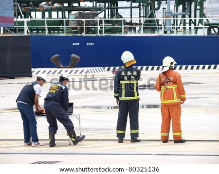 TAIPEI, TAIWAN - JUNE 29:The 2011 Jinhua exercise at the Port of Taipei on June 29,2011 in Bali,Taipei,Taiwan.A large anti-terrorism and disaster-response drill was staged at Taipei\'s port.