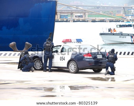 TAIPEI, TAIWAN - JUNE 29:The 2011 Jinhua exercise at the Port of Taipei on June 29,2011 in Bali,Taipei,Taiwan.A large anti-terrorism and disaster-response drill was staged at Taipei\'s port.