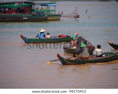 SIEM REAP, CAMBODIA-Mar 20: Cambodian people live  on Tonle Sap Lake in Siem Reap, Cambodia on March 20, 2012. Tonle Sap is the largest freshwater lake in SE Asia peaking at 16k km2