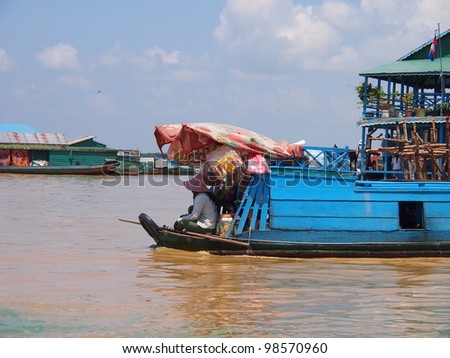 SIEM REAP, CAMBODIA - Mar 20: Cambodian people live beside Tonle Sap Lake in Siem Reap, Cambodia on March 20, 2012. Tonle Sap is the largest freshwater lake in SE Asia peaking