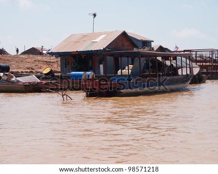 SIEM REAP, CAMBODIA - Mar 20: Cambodian people live beside Tonle Sap Lake in Siem Reap, Cambodia on March 20, 2012. Tonle Sap is the largest freshwater lake in SE Asia