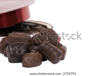 A pile of chocolates in front of a valentine heart.. which one to take?