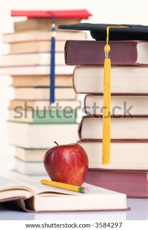 Going to school is your future. Education, learning, teaching. A graduation cap with an apple. Focus on Tassel