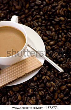 A hot cup of coffee brewed with fresh roasted beans.