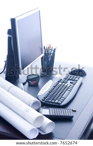 A professional desktop of an Engineer with drawings computer. W/B set for cool look.
