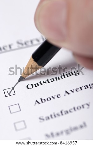 Filling out a customer service survey form.