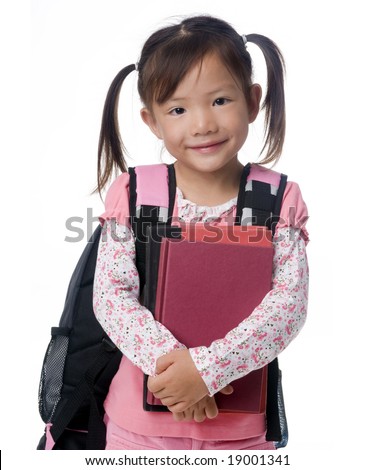 stock photo A young asian school girl ready for school