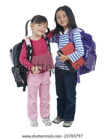 stock photo Two young asian school girls ready for school