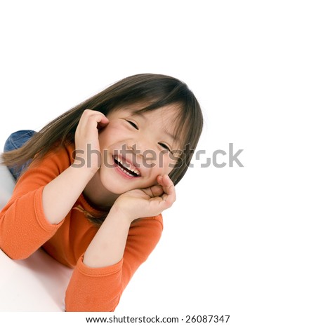 stock photo a young asian school girl being silly