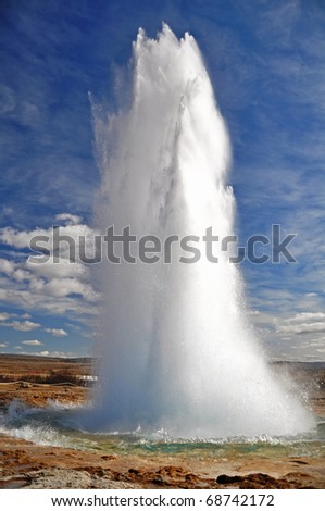Famous geyser Strokkur erupted in a sunny day, south Iceland