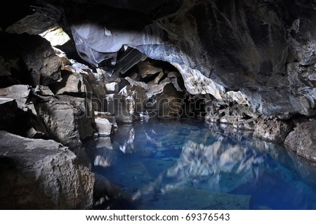 Natural cave filled by geothermal hot water, Myvatn, north Iceland