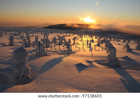 Sunset in the winter mountains landscape, The Krkonose mountain, Czech republic